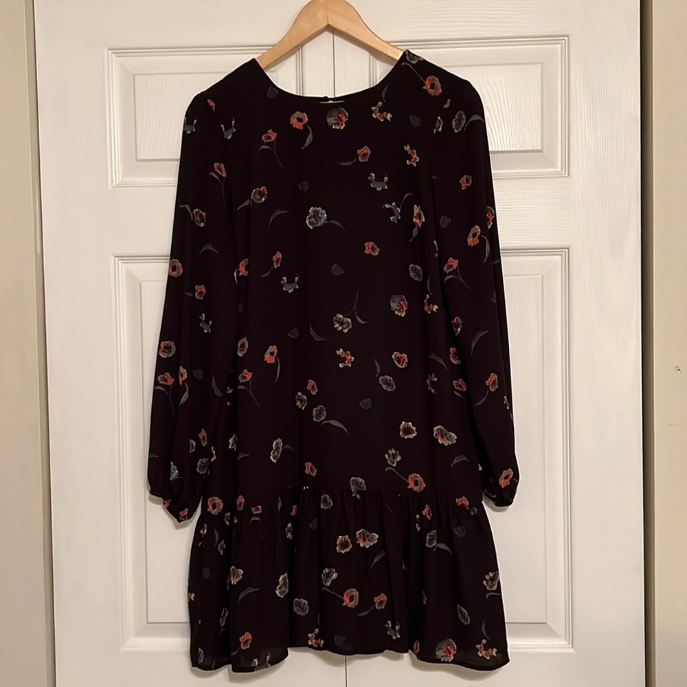 Short and flowy, light weight peplum dress.